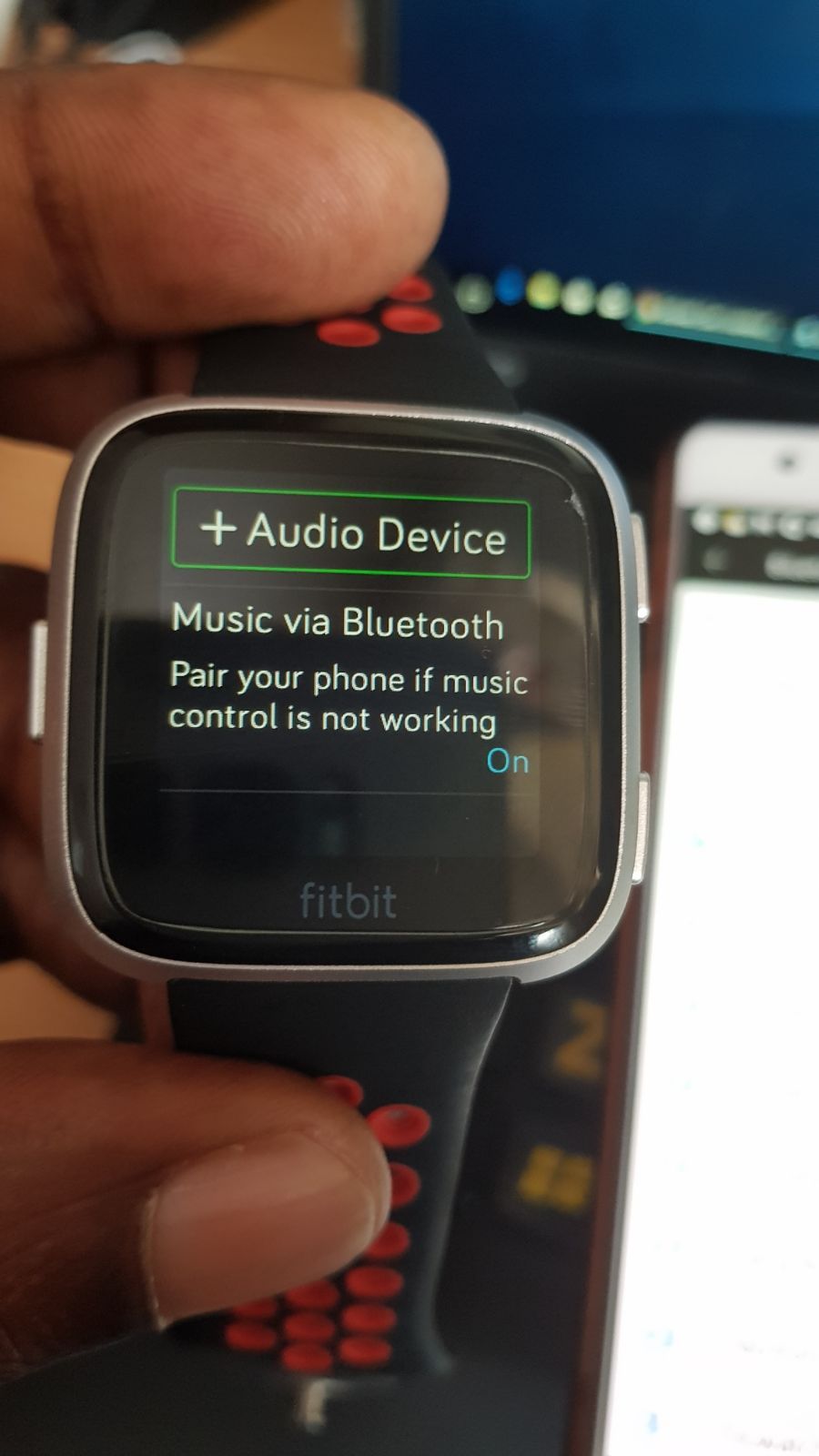 how do i use spotify on my fitbit versa 2